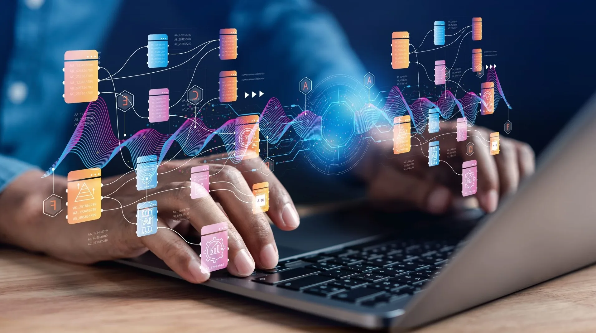 Hands typing on laptop with data analysis visualization overlay.